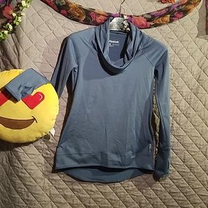 Reebok play warm, thumb hole. NWOT